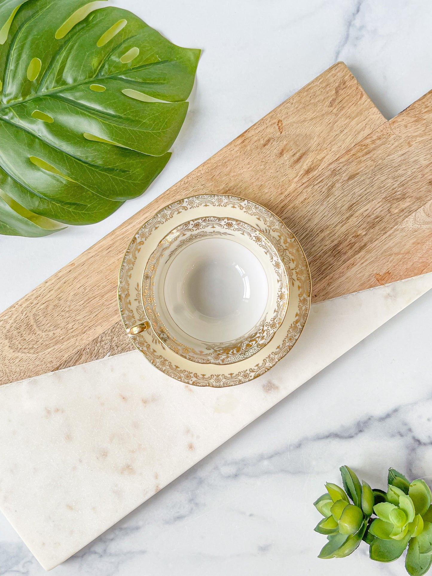 ivory and gold cup & saucer - golden china
