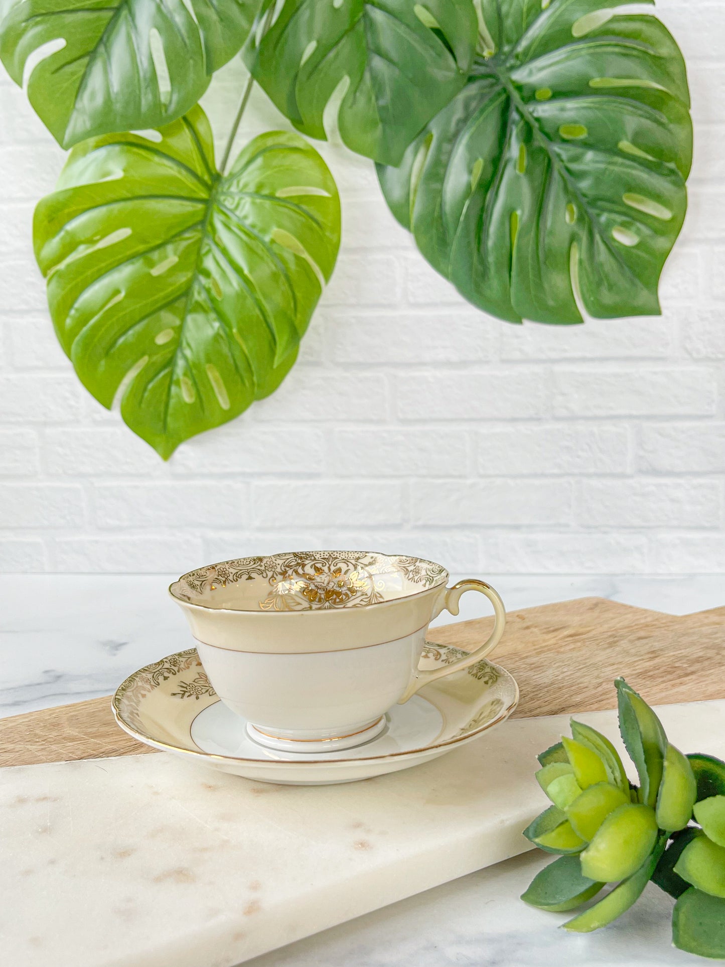 ivory and gold cup & saucer - golden china