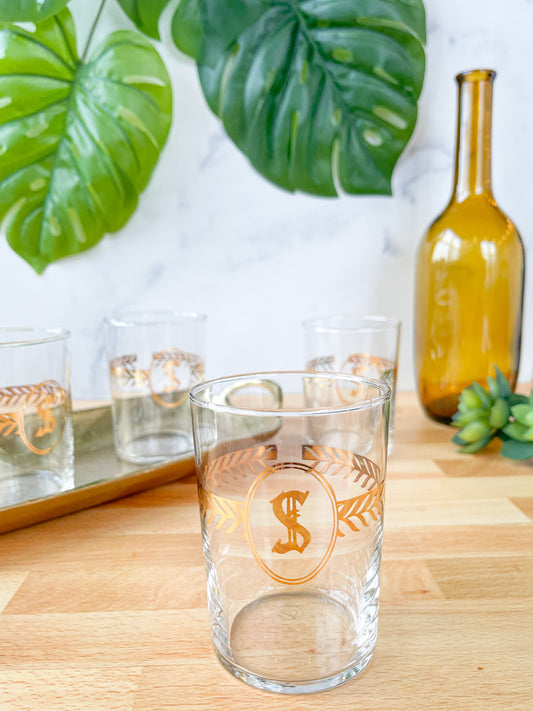 set of 4 "s" crested glasses